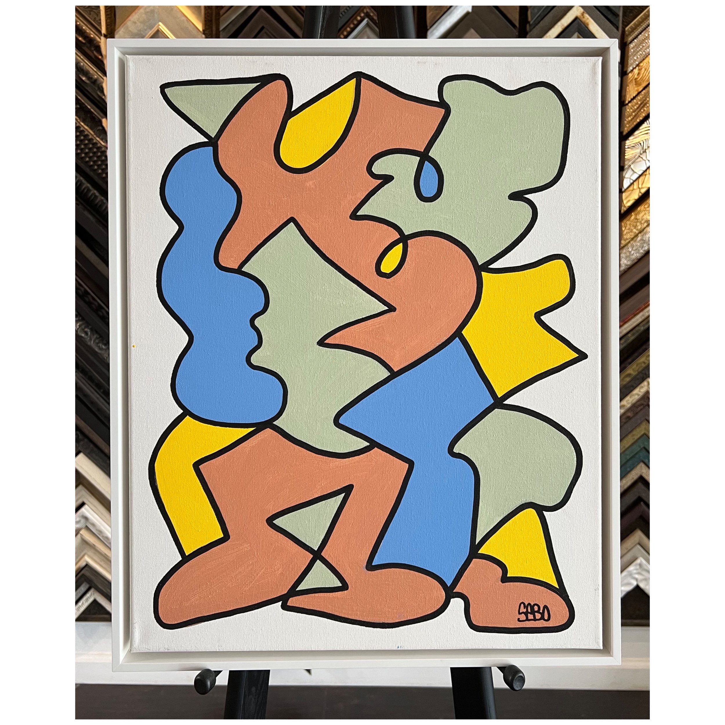 Canvas framed in floater frame at Underglass Custom Picture Framing