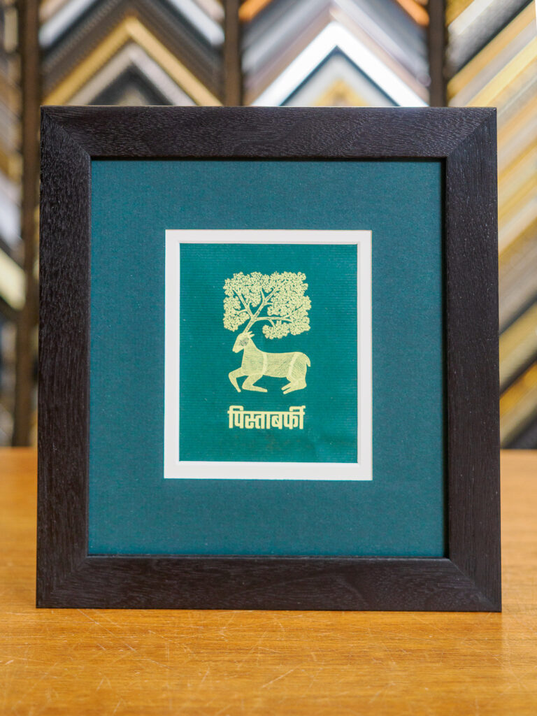 Advertising illustration framed with walnut frame and layered mats in San Francisco
