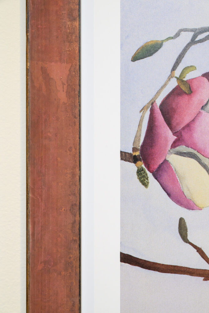 Gold-surfaced edges on rust-brown powder-coated picture frame, custom framing Castro San Francisco