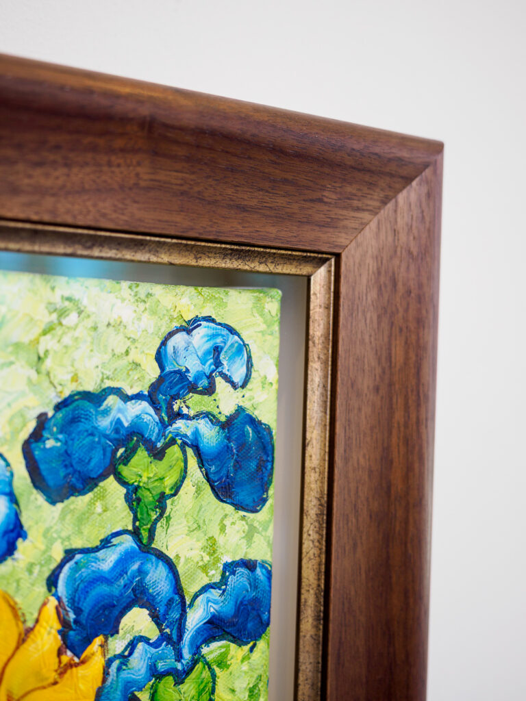 Canvas painting framed with floater frame and walnut outer frame in San Francisco