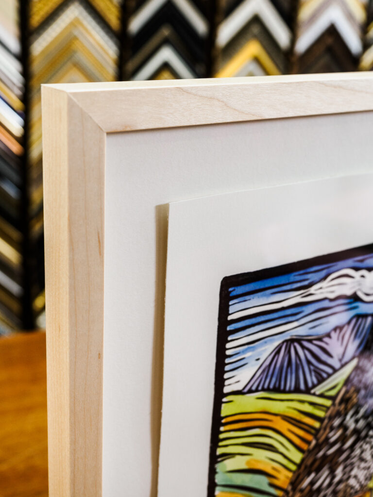 Close-up of float mounted deckled edge woodblock print in clear maple frame, custom picture framing San Francisco