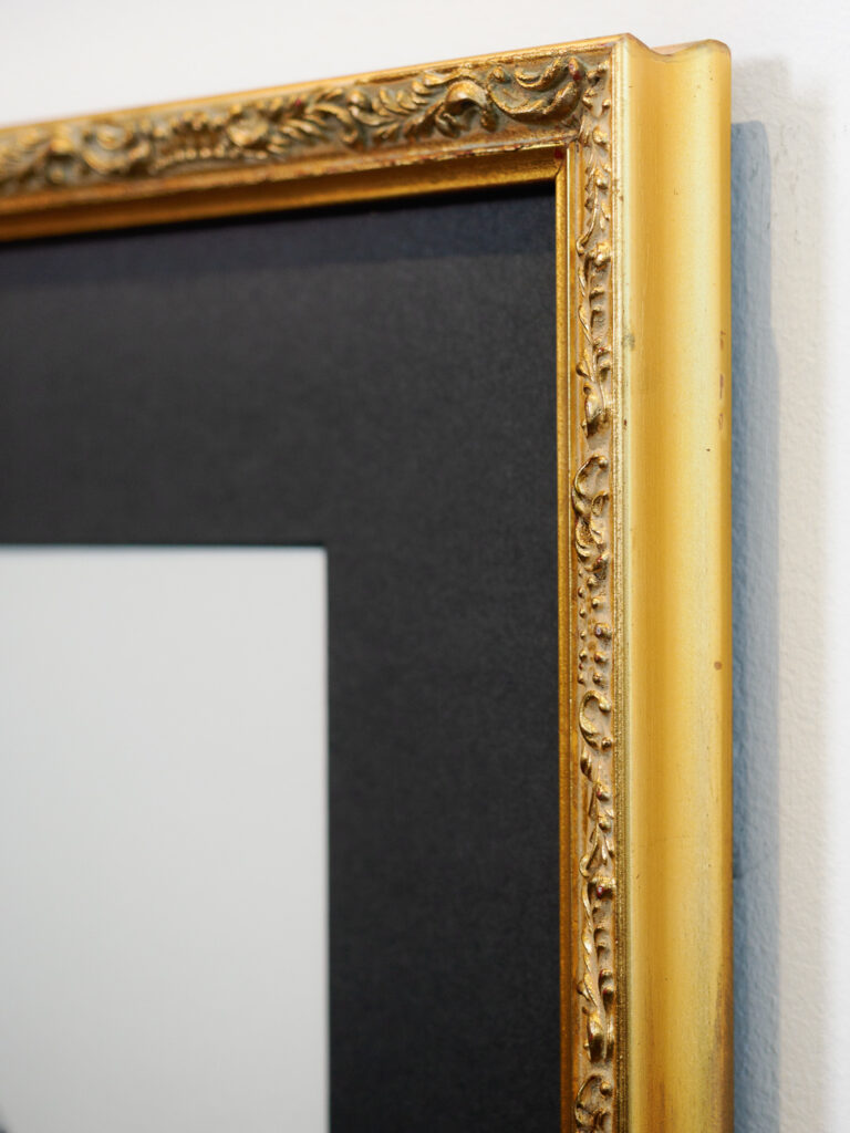 Close-up of antique gold frame ornamentation and scuff mark detail, custom art framing San Francisco Underglass
