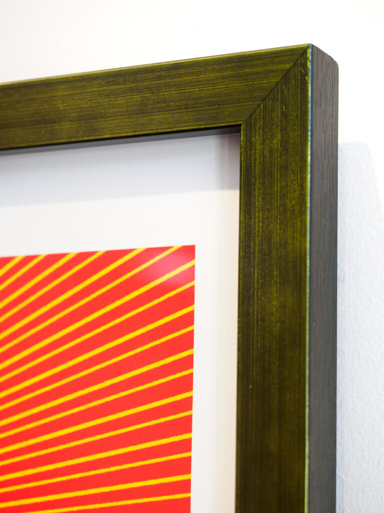  Close-up of brushed green frame and recessed Optium Museum Acrylic with spacers, custom poster framing San Francisco