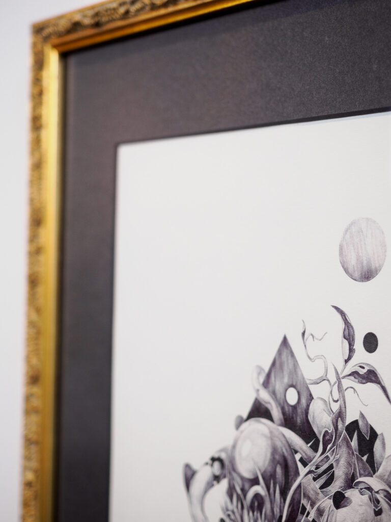 Close-up of deep charcoal mat with light shift detail, custom art framing San Francisco Underglass

