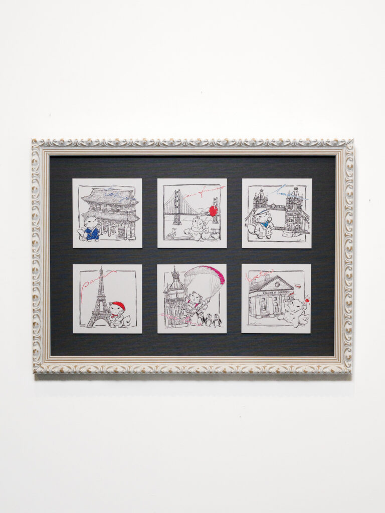 Collection of Bao by Andrea travel cat drawings floated on silk mat in off-white scuff marked frame, Castro frame shop San Francisco