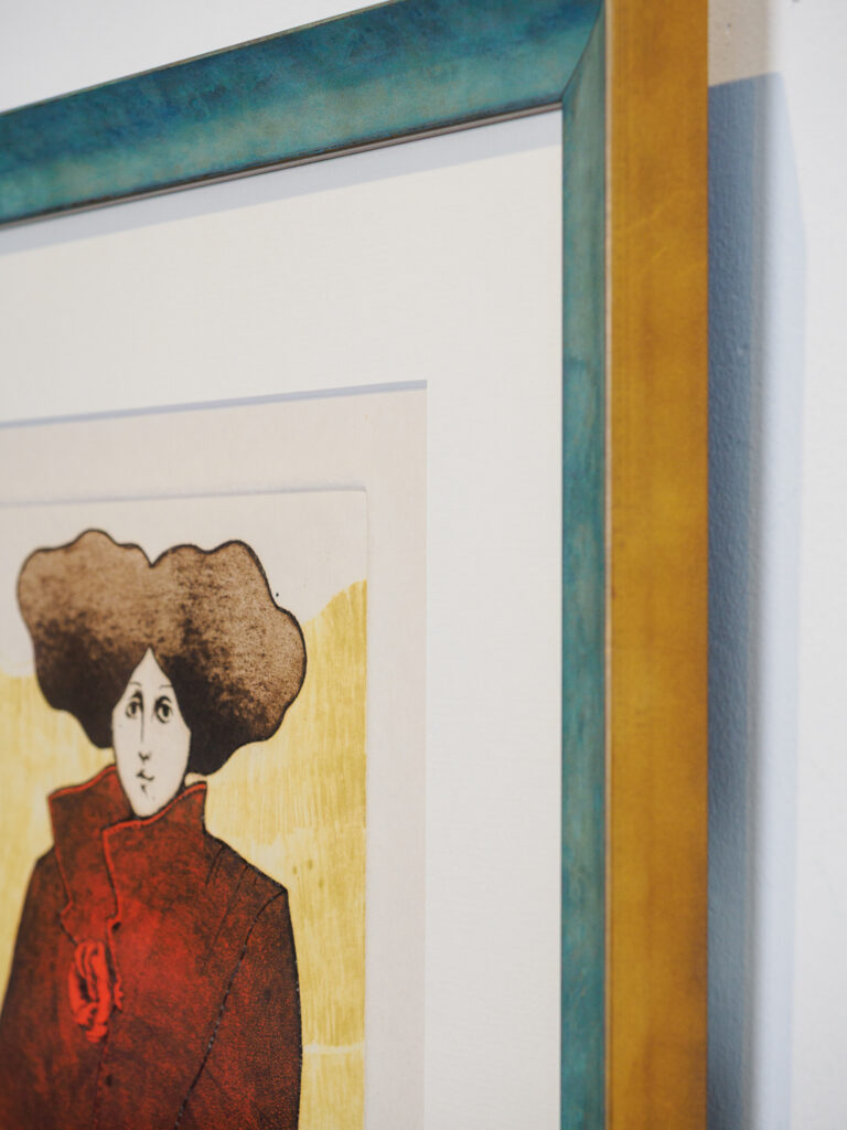 Close-up of wide off white beveled mat showing plate mark on Tarragó etching, custom picture framing San Francisco Underglass
