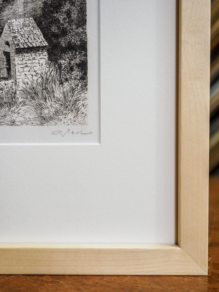 Close-up of wide white mat with clean bevel on vintage etching, contemporary frame design San Francisco Underglass