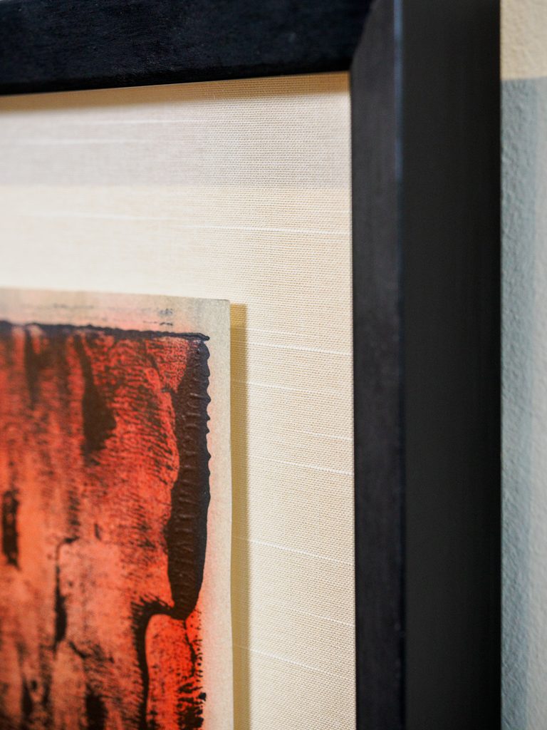 Close-up of float-mounted print on golden silk mat inside shadowbox, custom conservation framing Castro San Francisco