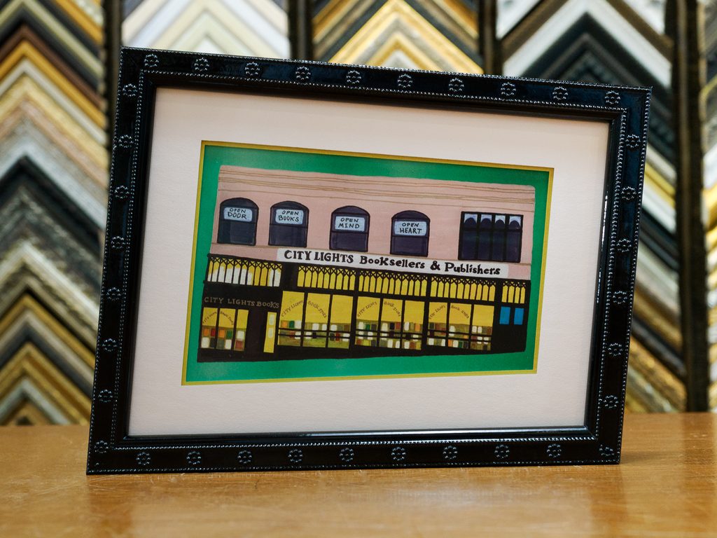 City Lights Bookstore painting in angled beaded black frame with white mat and green accent, custom picture framing San Francisco