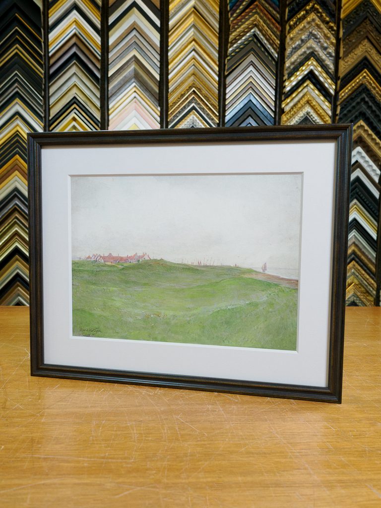 David Waterson coastal landscape in dark rustic wood frame with 8-ply off-white bevel mat, custom picture framing San Francisco Underglass